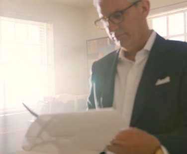 A Rutter Mills attorney reviewing a case file